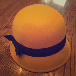 Mustard wool cloche with navy ribbon